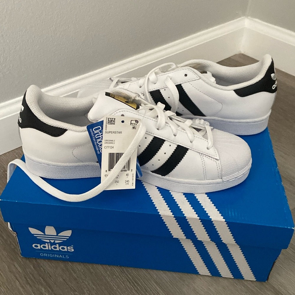Adidas Superstar black and white women’s 8, men’s 7